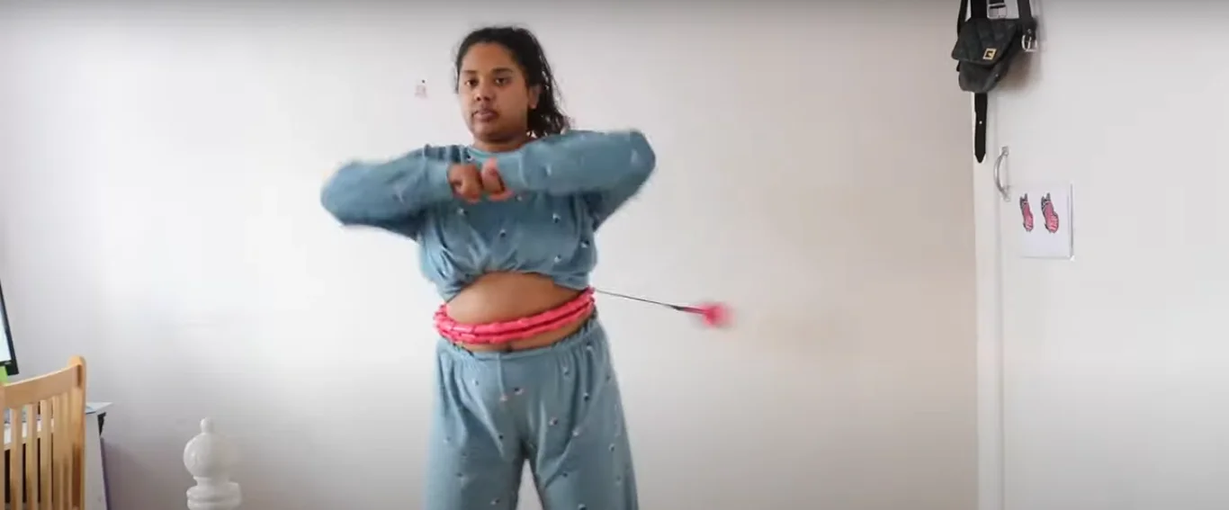 Fun fitness challenges including hoop and dance activities for workplace wellness
